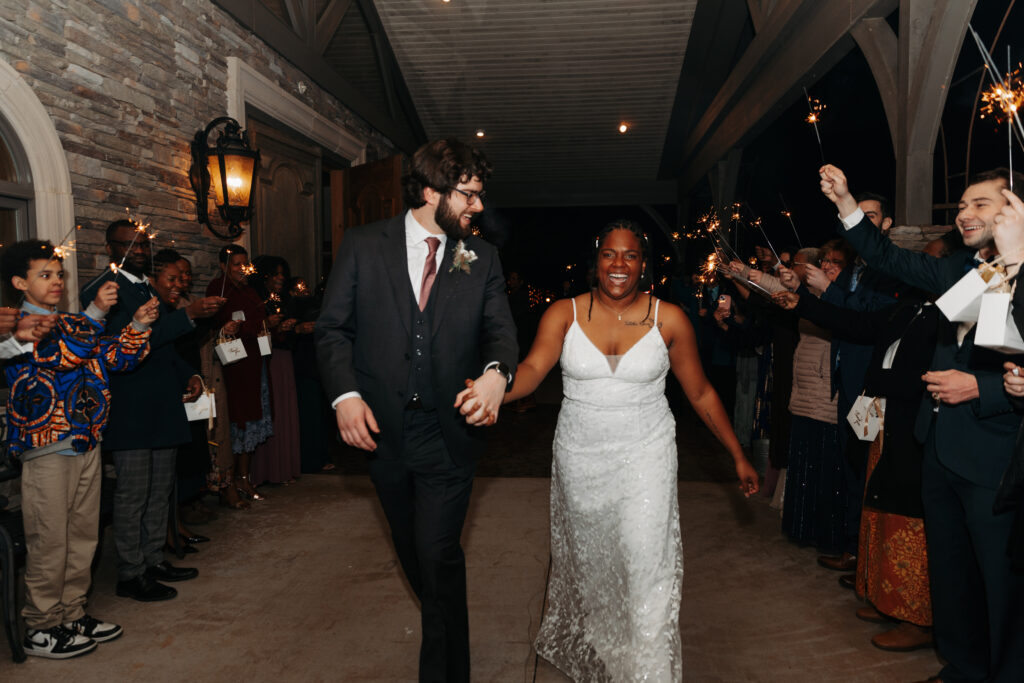 bride and groom sparkler exit at The Oaks Wedding Venue