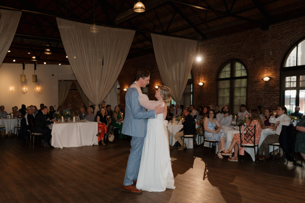Bride and groom during their wedding reception during at The L in downtown Greenville, SC.