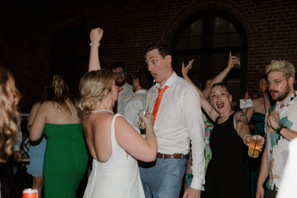 Bride and groom during their wedding reception during at The L in downtown Greenville, SC.